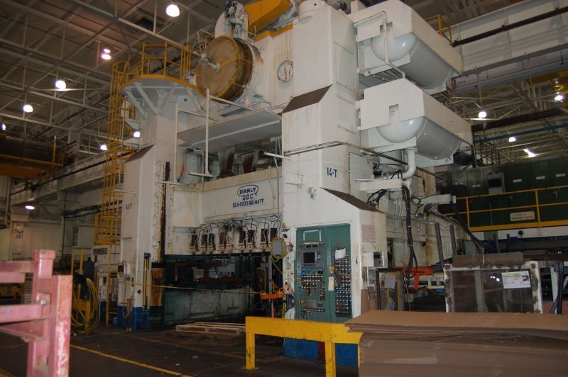 1983 used 2000 Ton Danly #SE4-2000-180-84 TFQ 4-Point Eccentric Geared Straight Side  Press for sale